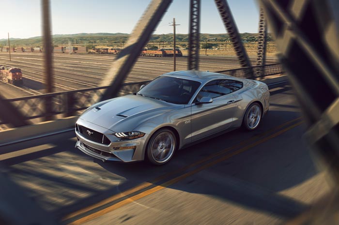 2018-Ford-Mustang-V8-GT-with-Performance-Pack-front-three-quarter-in-motion.jpg